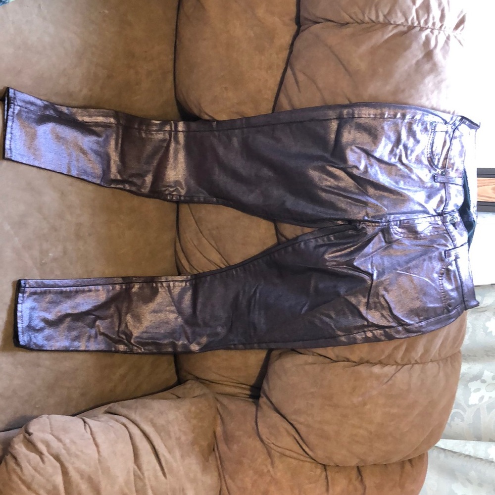 Stretchy purple shimmer skinny jeans.